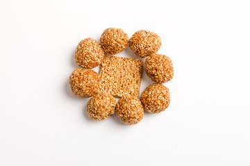 Indian sweet dish,Sesame seeds ball or called in hindi, til ke laddu on white background 