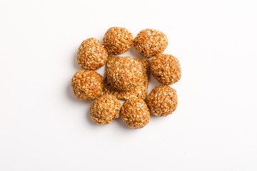 Indian sweet dish,Sesame seeds ball or called in hindi, til ke laddu on white background 