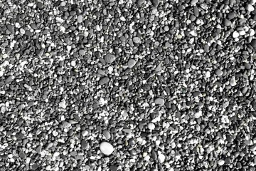 glossy river pebbles wet by waves texture - fantastic abstract photo background