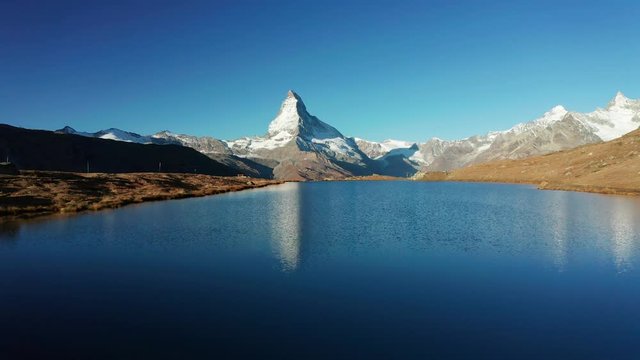 Matterhorn peak reflected in Stellisee Lake in Zermatt, Switzerland.