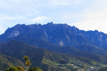 Naklejka premium Amazing beautiful scenery view of the greatest Mount Kinabalu Sabah, Borneo Island with local village house view from Kundasang Town, Sabah, Borneo