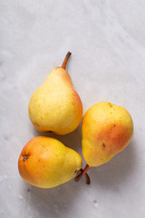 pears on marble background with copy space