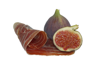 Dry cured ham and figs isolated on white