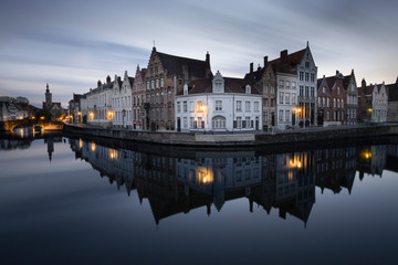 the mirrorrey in Bruges  (Belgium)during the blue hour. One of the hotspots in Bruges for the tourists. Photo with a filter "big stopper" to make the clouds move.