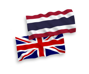 Flags of Great Britain and Thailand on a white background