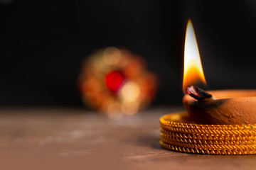 Happy diwali / karthigai deepam - Hindus religious festival - Candle flame close-up