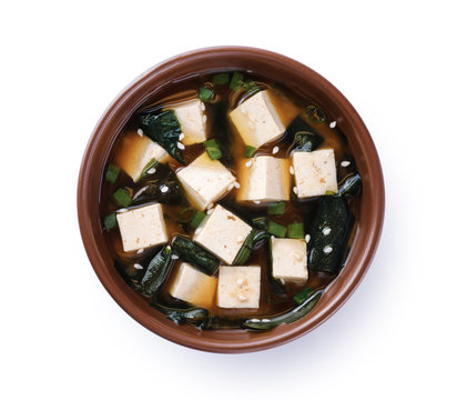 Bowl with miso soup isolated on white background.