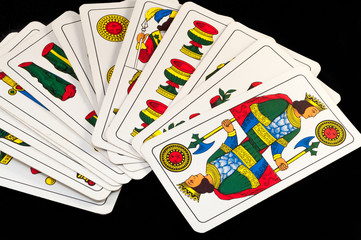 close up of many colorful briscola cards