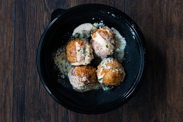 Take Away Fried Mac and Cheese Balls with Parmesan Cheese / Macaroni Bites in Plastic Plate Box Package / Container.