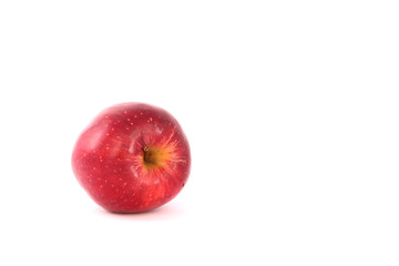 A beautiful red apple on display