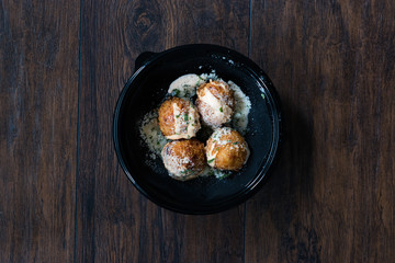 Take Away Fried Mac and Cheese Balls with Parmesan Cheese / Macaroni Bites in Plastic Plate Box Package / Container.