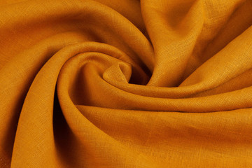Orange fabric with folds background