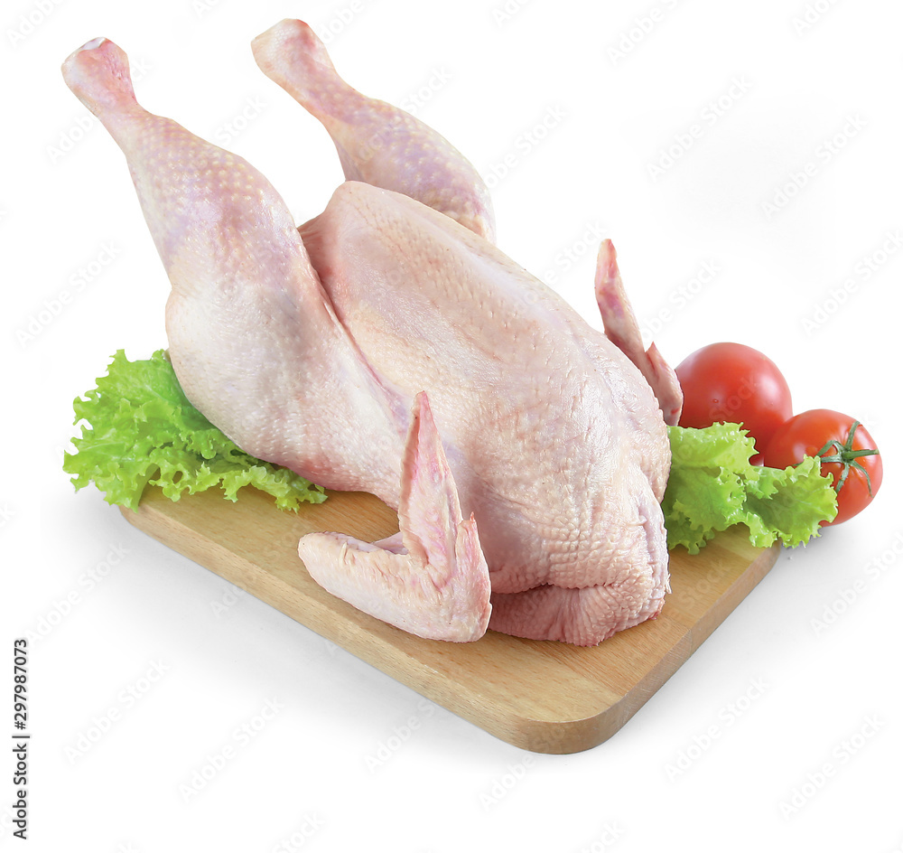 Wall mural whole raw chicken with tomatoes - isolated