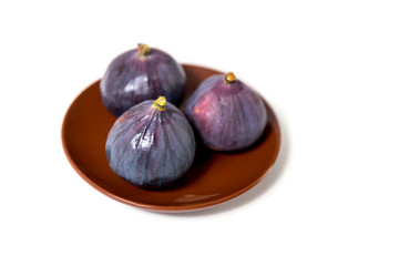 Fototapeta premium Three ripe fruits on a white isolated background.