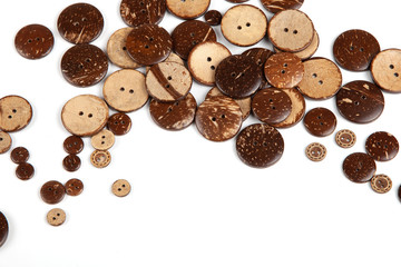 Obraz premium Wooden button on white backgroung with sapce for text