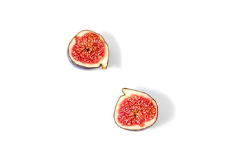 Halves of ripe fruit on a white background.