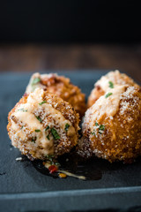 Fried Mac and Cheese Balls with Parmesan Cheese and Mayonnaise / Macaroni Bites.