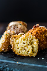 Half Cut Fried Mac and Cheese Balls with Parmesan Cheese / Macaroni Bites.