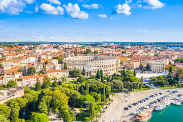 Fototapeta na wymiar Croatia, city of Pula, ancient Roman arena, historic amphitheater and old town center fron drone, aerial view