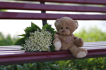 teddy bear with flowers