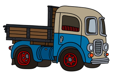 The vectorized hand drawing of a funny old blue and cream lorry truck