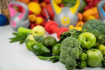 Healthy nutrition and equipment for fitness exercises.