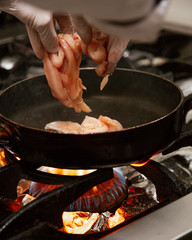 octopus in the pan on the furnace