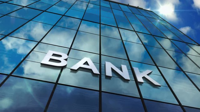 Bank sign on glass skyscraper. Time lapse sky and sun rays mirrored in modern building facade. Business and finance concept in loopable and seamless 3D rendering animation.