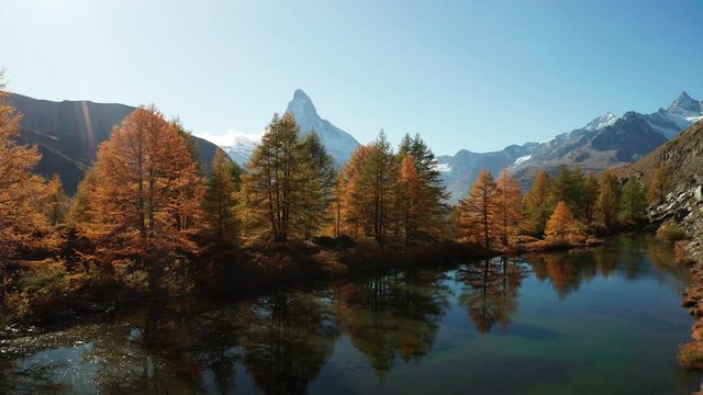 Matterhorn peak reflected in Grindjisee Lake in Zermatt, Switzerland.