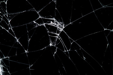 cracked glass isolated on a black background.