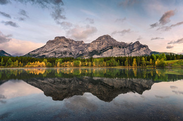 Canadian rockies reflection on Wedge pond in the morning at Kananaskis country