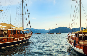 Fototapeta na wymiar wooden sailboat cruise ship near the pier Turkish coast.