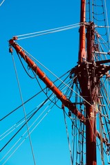 Fototapeta premium blue sky and mast of old sailing ship in the seaport