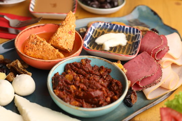 Turkish breakfast with salami honey and butter
