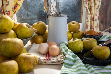 ingredients for apple pie, apples, eggs, dough