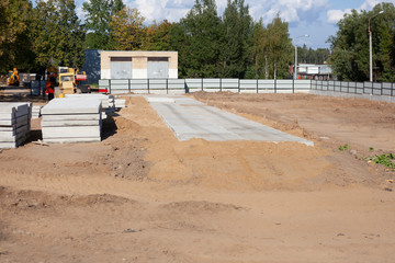 Construction site for building a building. Building materials sand and stone. Preparation of the construction site.