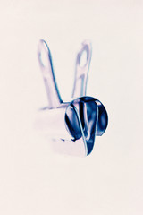 Small shiny Metal Bulldog Clip with shallow depth of focus