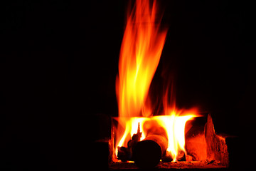 Burning, burning flame in the stove.