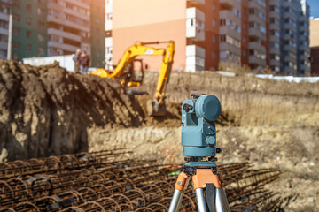 Surveyor equipment GPS system or theodolite outdoors at highway construction site.Measuring instrument close-up. Surveyor engineering with total station