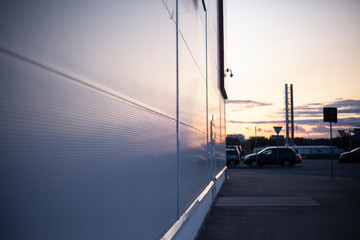 Wall of a warehouse building. The surface of the house. Build a shopping center.