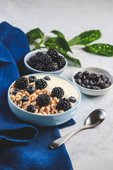 Bowl filled with corn ring cereals and berries. Healthy breakfast