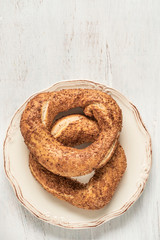 crispy Turkish bagel, simit on a wooden table