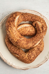 crispy Turkish bagel, simit on a wooden table