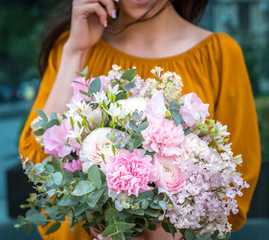 flower bouquet in girl hands