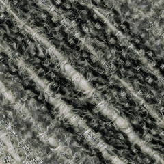 Close-up of handwoven woolen fabric texture