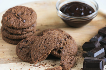 Brown biscuits with dark chocolate composition
