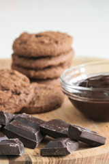 Brown biscuits with dark chocolate composition