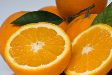 Sliced orange fruit to squeeze