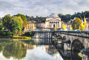 Ancient Bridge in Turin and the River Po