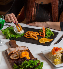 onion rings on wooden board